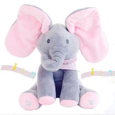 La sbirciata musicale un elefante di fischio gioca a nascondino i giocattoli coccoli della peluche del bambino elettrico