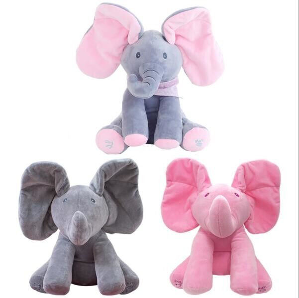 La sbirciata musicale un elefante di fischio gioca a nascondino i giocattoli coccoli della peluche del bambino elettrico